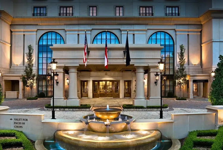 Hotel entrance with glass doors and unique glass windows